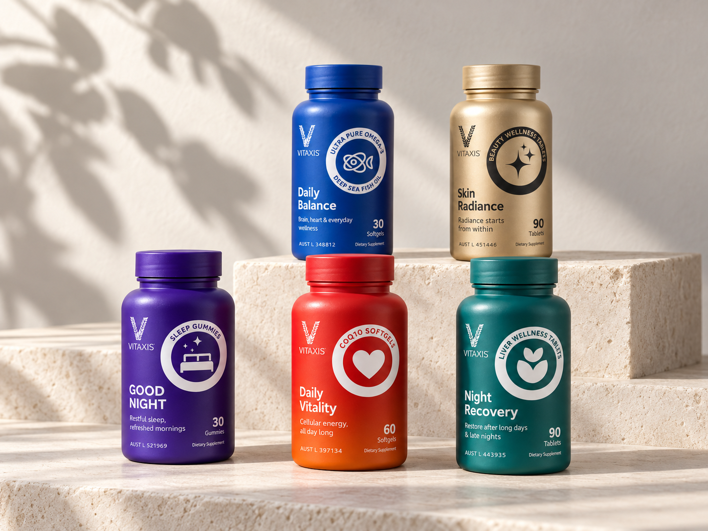The five VITAXIS nutrition products displayed on a pale shelf: Good Night, Daily Balance, Daily Vitality, Night Recovery and Skin Radiance